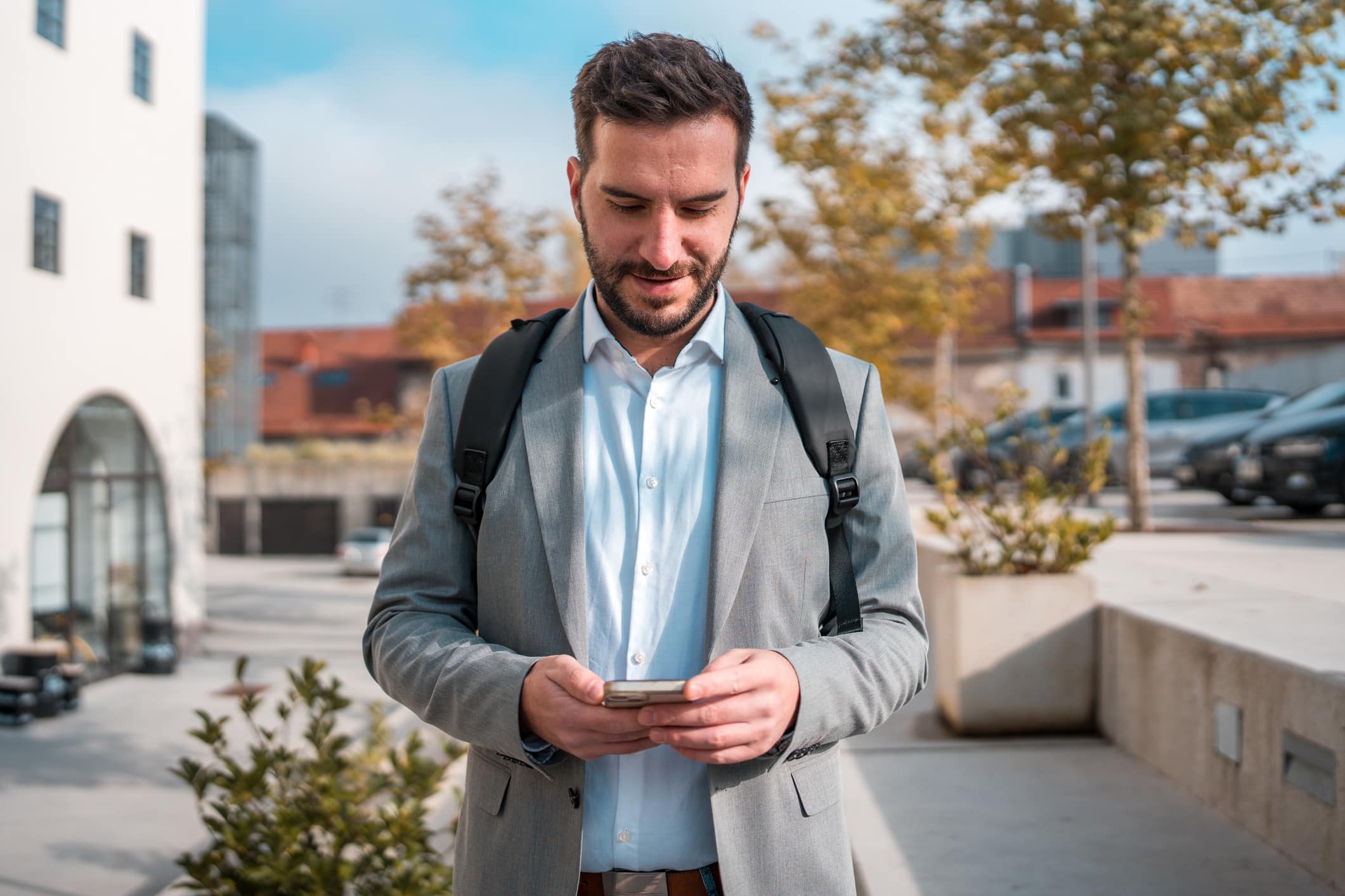 Caucasian Man Mobile Banking On The Go